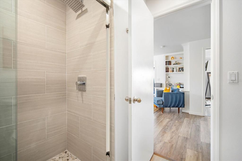 203 72nd Street Holmes Beach, FL 34217 - Photo 22 of 75 a view of a bathroom with a shower