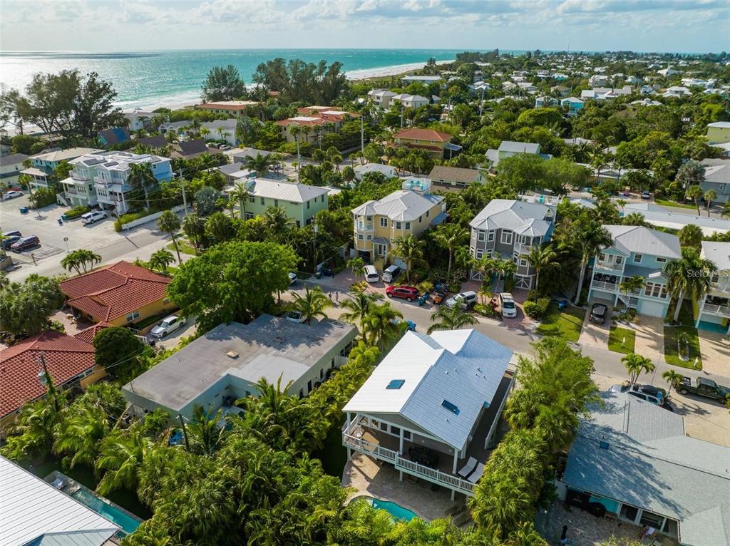 203 72nd Street Holmes Beach, FL 34217 - Photo 68 of 75 an aerial view of residential houses with outdoor space
