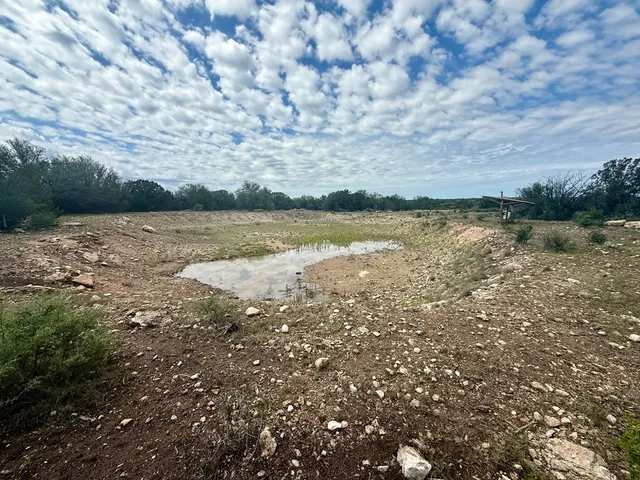 a view of lake with mountain