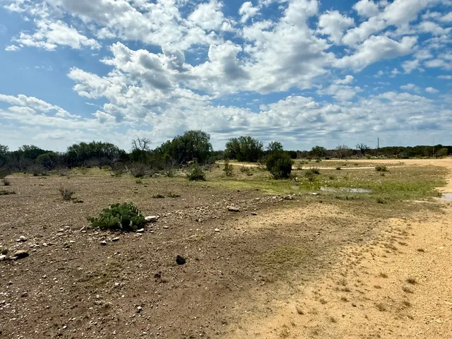 a view of a lake with beach