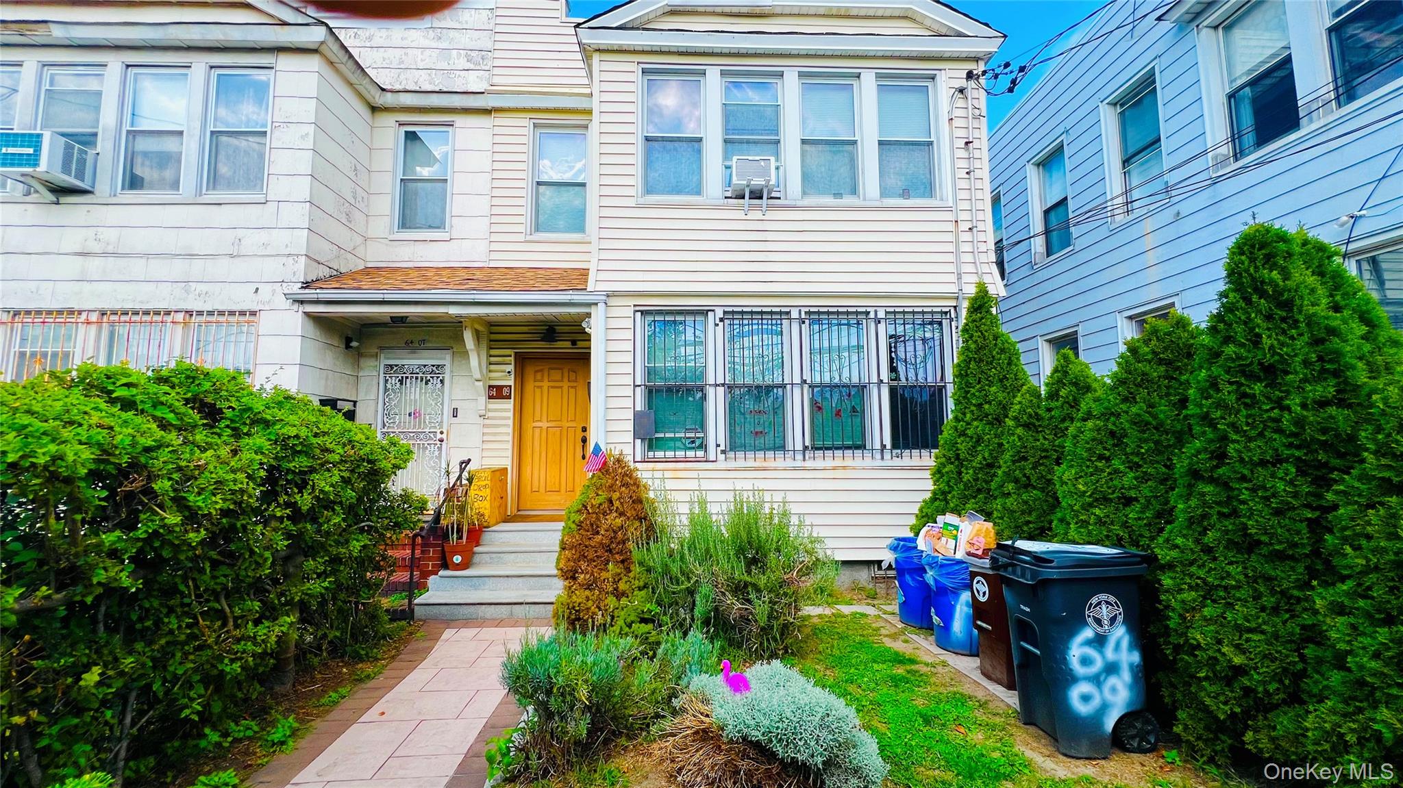 a house view with a garden space