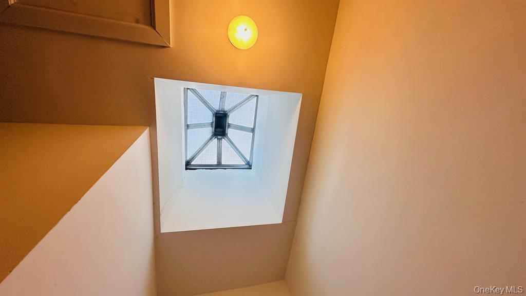 64-09 Woodside Avenue, Unit 2 FAMILY FRAME Queens, NY 11377 - Photo 9 of 17 a view of staircase