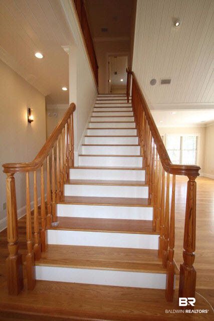 12900 Honey Rd Extension Summerdale, AL 36580 - Photo 24 of 44 Gorgeous oak staircase with teak ballisters