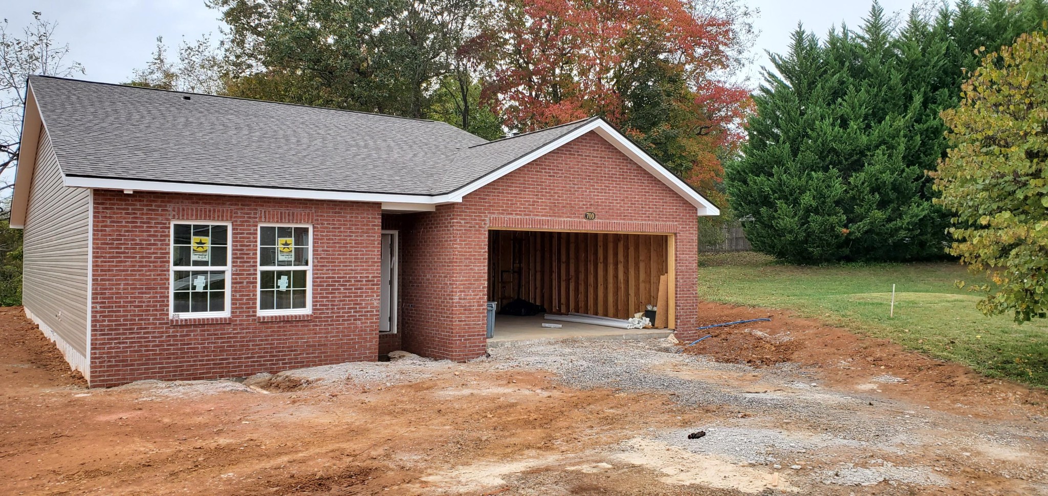 700 Spring Park Road Knoxville, TN 37914 - Photo 1 of 25 a front view of a house with garden