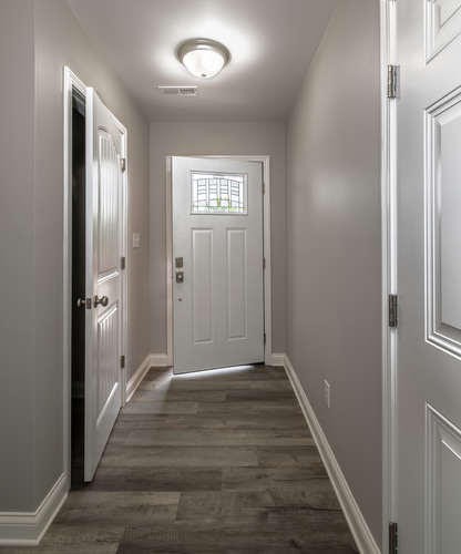 700 Spring Park Road Knoxville, TN 37914 - Photo 13 of 25 a view of a hallway with wooden floor