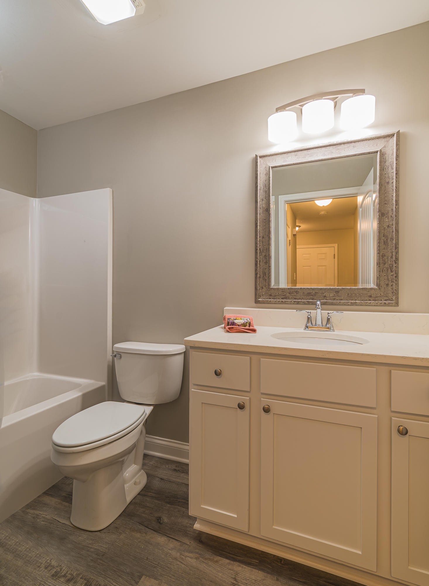 700 Spring Park Road Knoxville, TN 37914 - Photo 15 of 25 a bathroom with a toilet sink and mirror