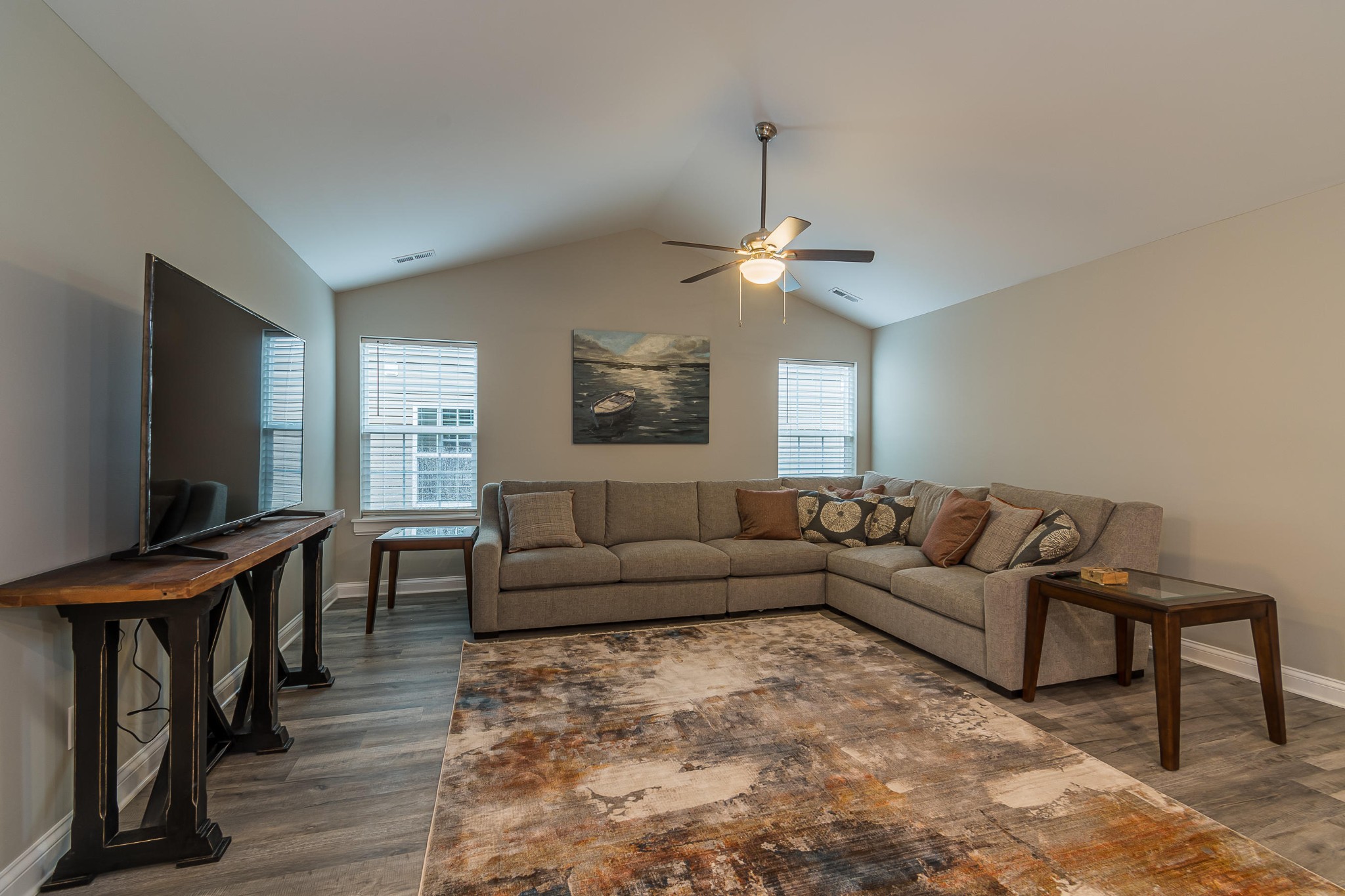 700 Spring Park Road Knoxville, TN 37914 - Photo 17 of 25 a living room with furniture and a flat screen tv