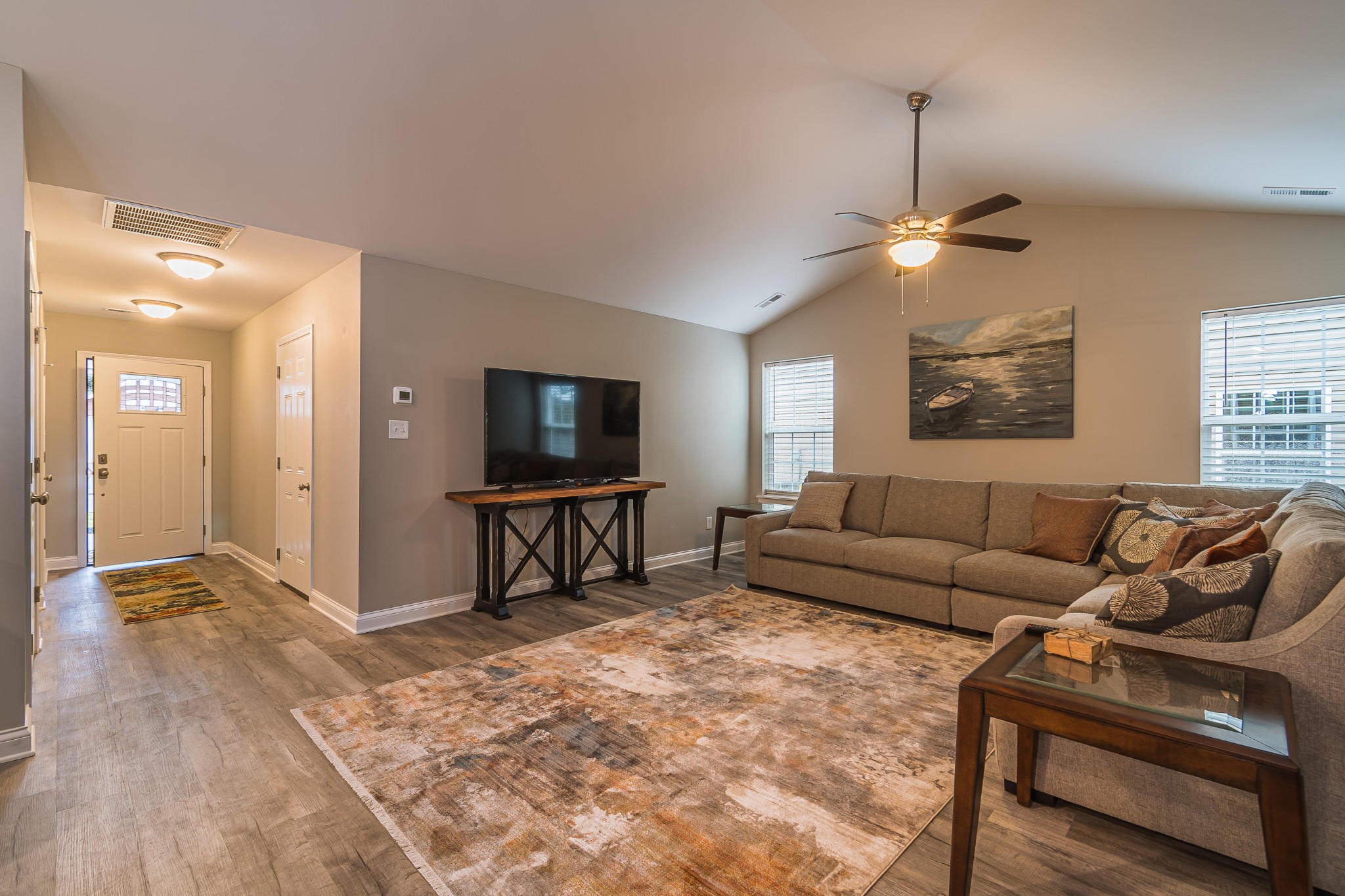 700 Spring Park Road Knoxville, TN 37914 - Photo 18 of 25 a living room with furniture and a flat screen tv