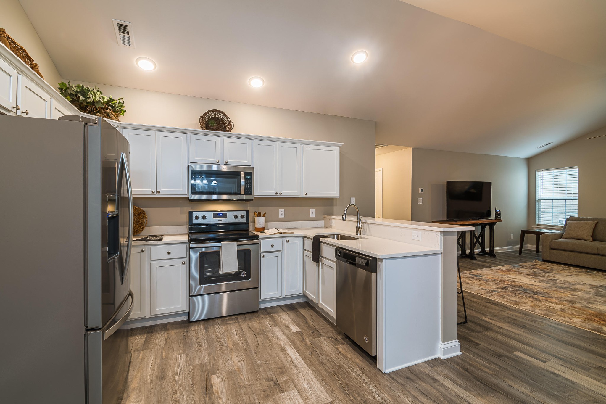 700 Spring Park Road Knoxville, TN 37914 - Photo 21 of 25 a kitchen with a stove a refrigerator and a microwave
