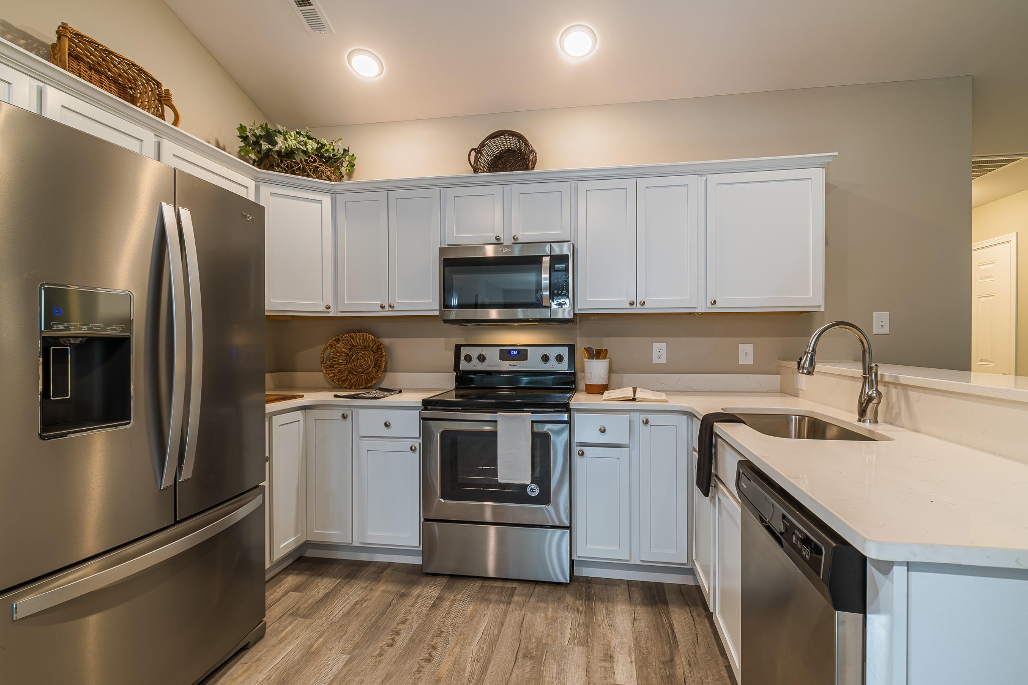 700 Spring Park Road Knoxville, TN 37914 - Photo 22 of 25 a kitchen with a sink stainless steel appliances and cabinets