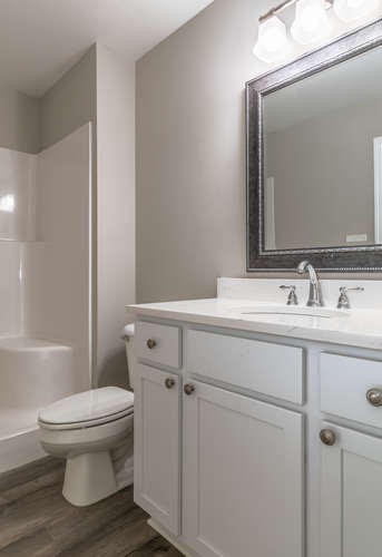 700 Spring Park Road Knoxville, TN 37914 - Photo 10 of 25 a bathroom with a toilet sink and mirror