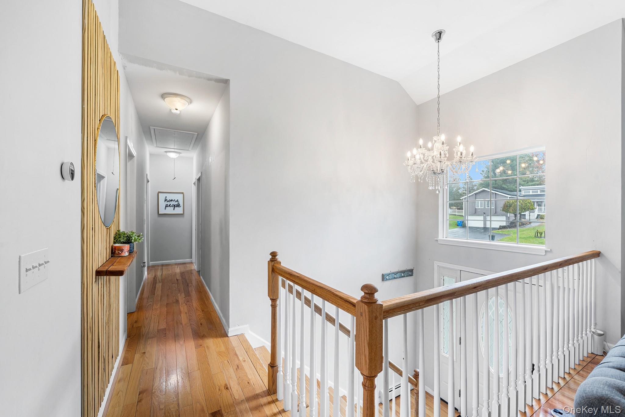 5 Oak Ridge Road Middletown, NY 10940 - Photo 11 of 24 a view of a hallway view with wooden floor and staircase