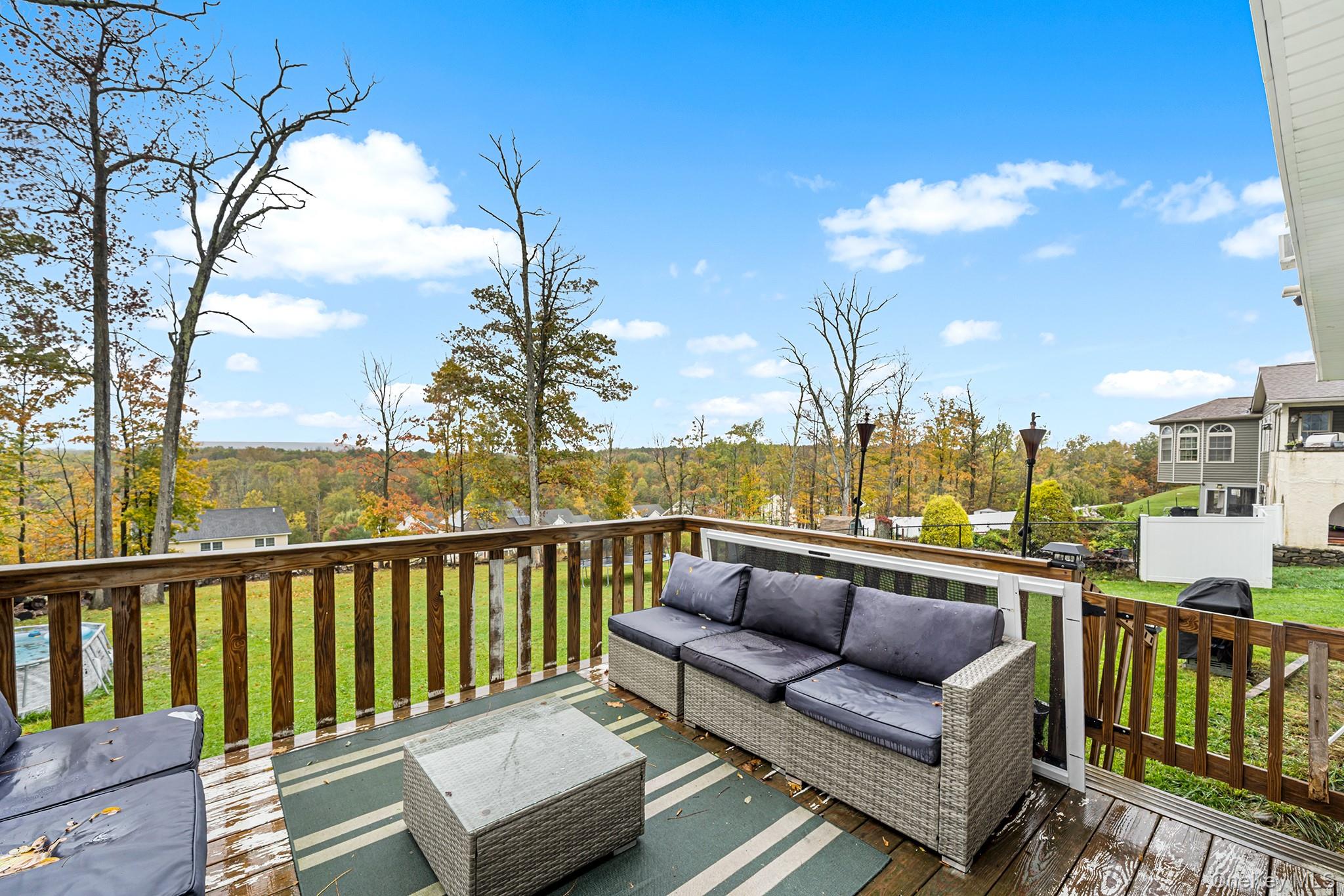 5 Oak Ridge Road Middletown, NY 10940 - Photo 21 of 24 a balcony with wooden floor and city view
