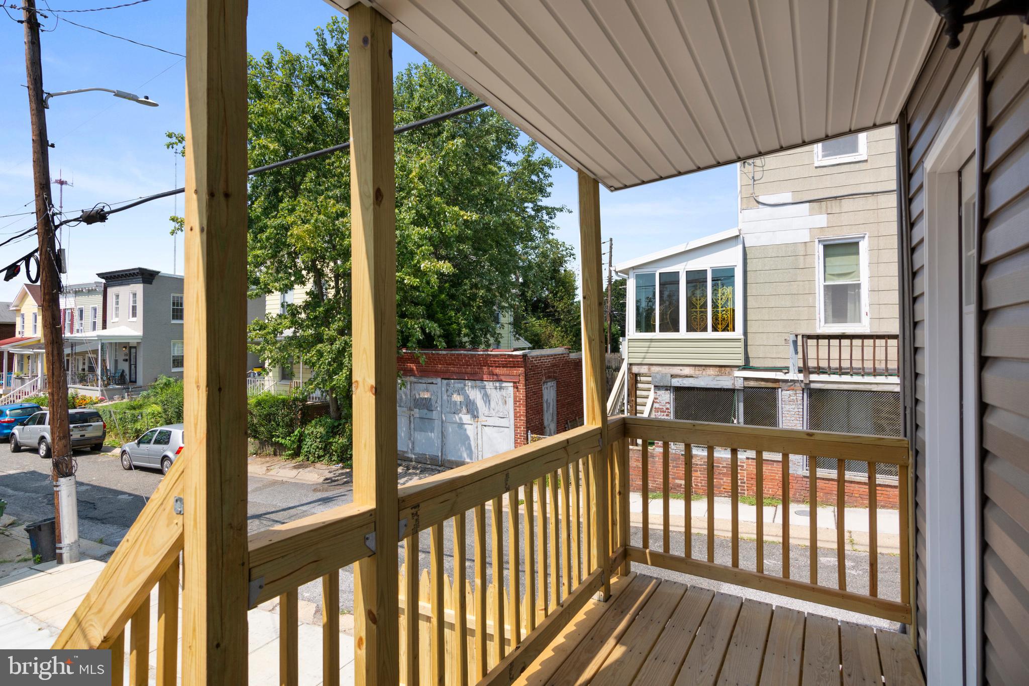 3738 Falls Road Baltimore, MD 21211 - Photo 28 of 39 Covered porch off main floor patio;