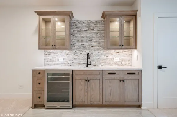 a bathroom with a sink double vanity and a mirror
