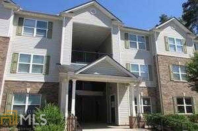a front view of a house with a porch