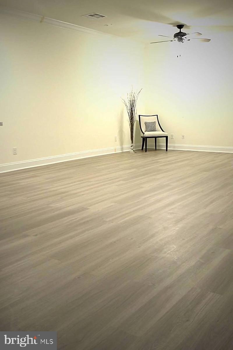 1812 Main Street, Unit 203 Chester, MD 21619 - Photo 11 of 24 a view of a room with an empty space