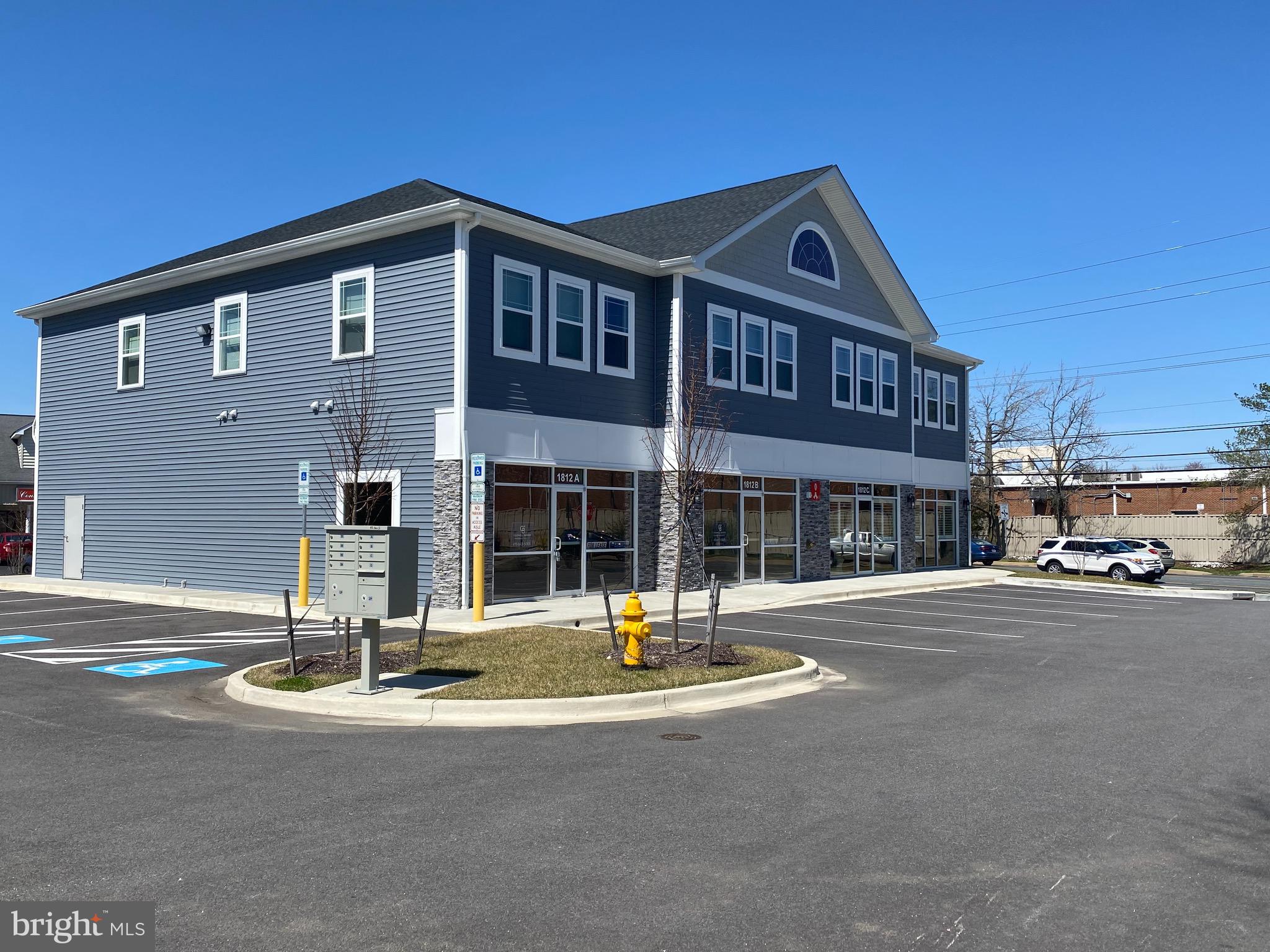 1812 Main Street, Unit 203 Chester, MD 21619 - Photo 23 of 24 a front view of a building with street view
