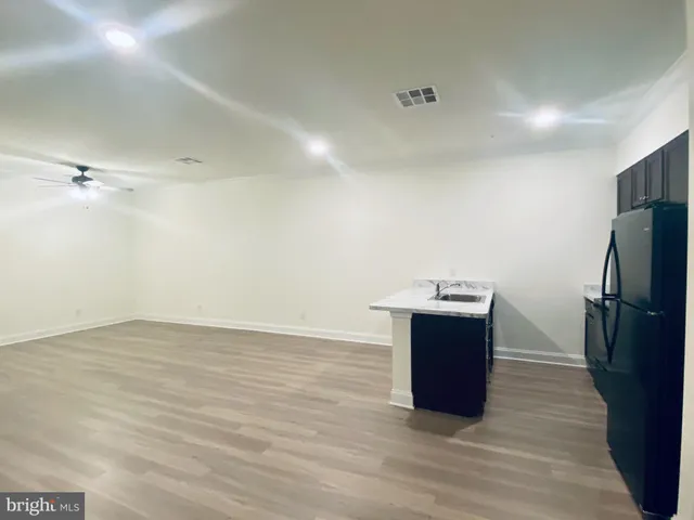 a front view of a building with street view