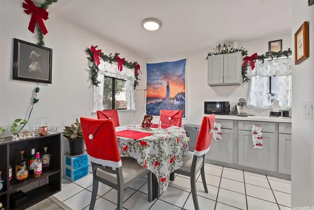 a living room with furniture and flat screen tv