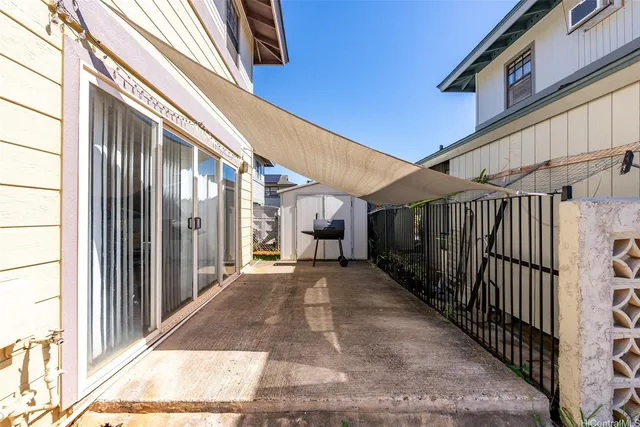 a view of a porch with wooden floor and stairs