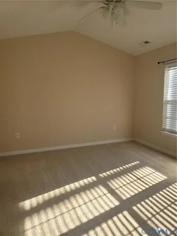 a view of an empty room and window