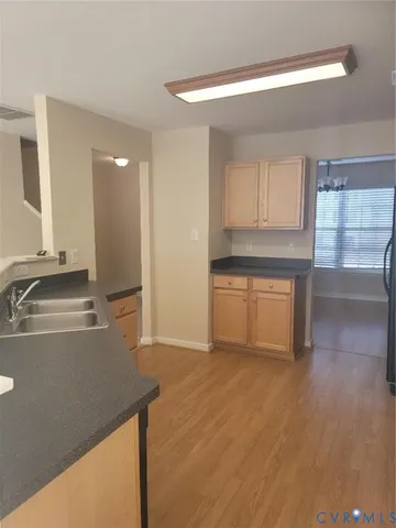 a view of a kitchen with a sink