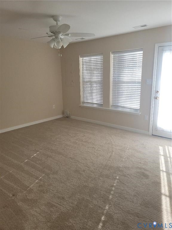 13519 Ridgemoor Drive Midlothian, VA 23114 - Photo 10 of 15 an empty room with chandelier fan