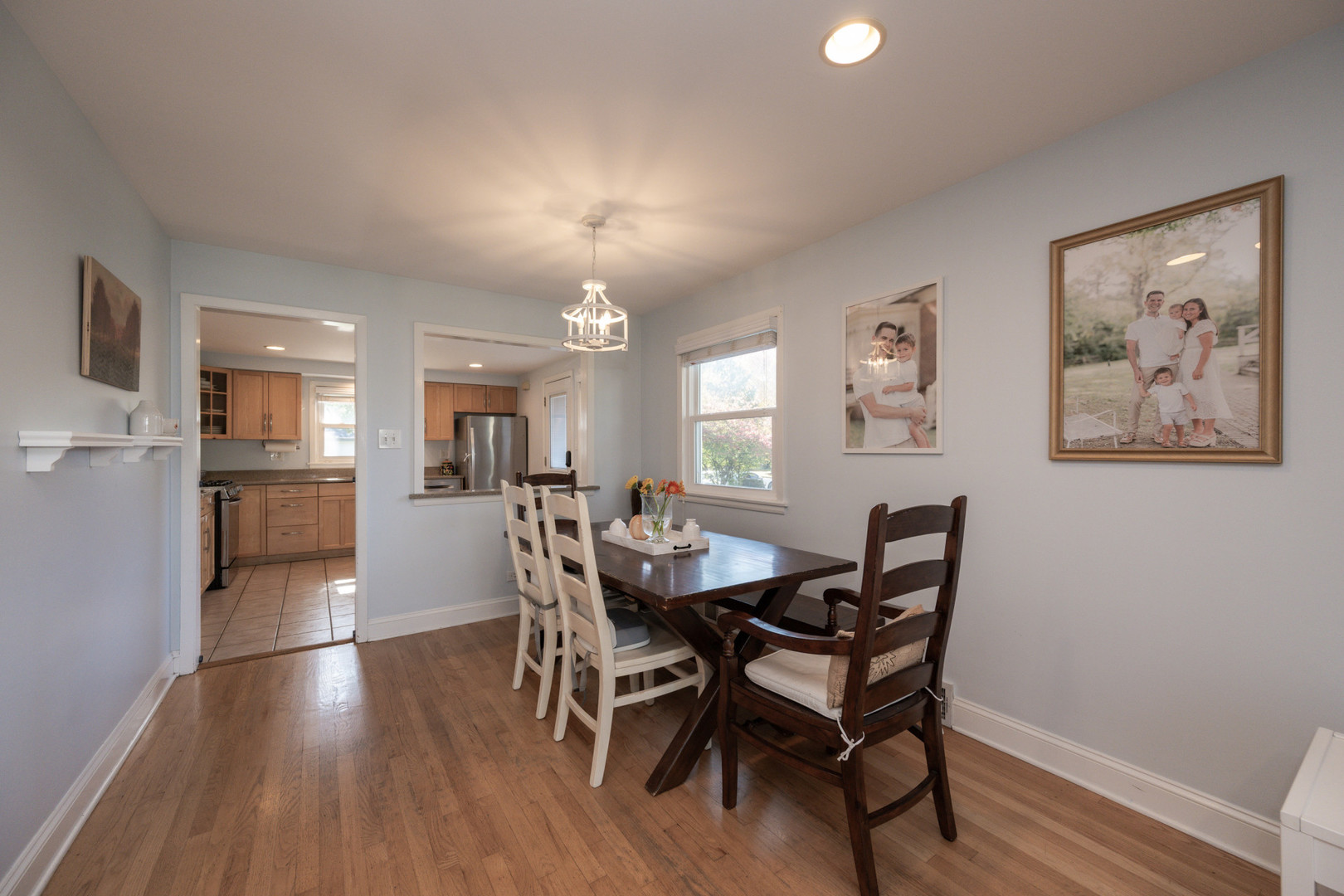 950 Brookside Lane Deerfield, IL 60015 - Photo 12 of 13 a view of a dining room with furniture and wooden floor