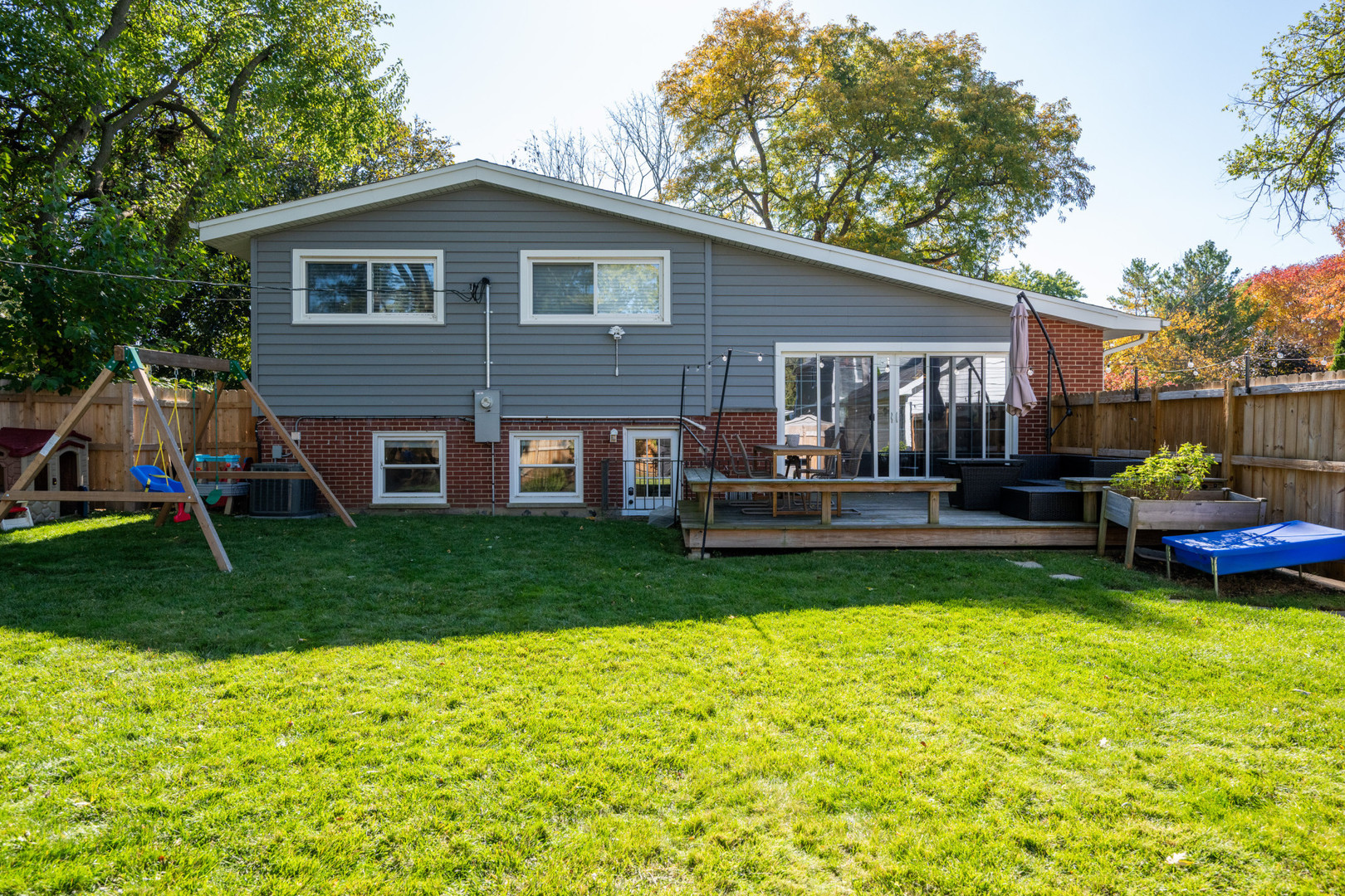 950 Brookside Lane Deerfield, IL 60015 - Photo 4 of 13 a view of a house with a yard porch and sitting area