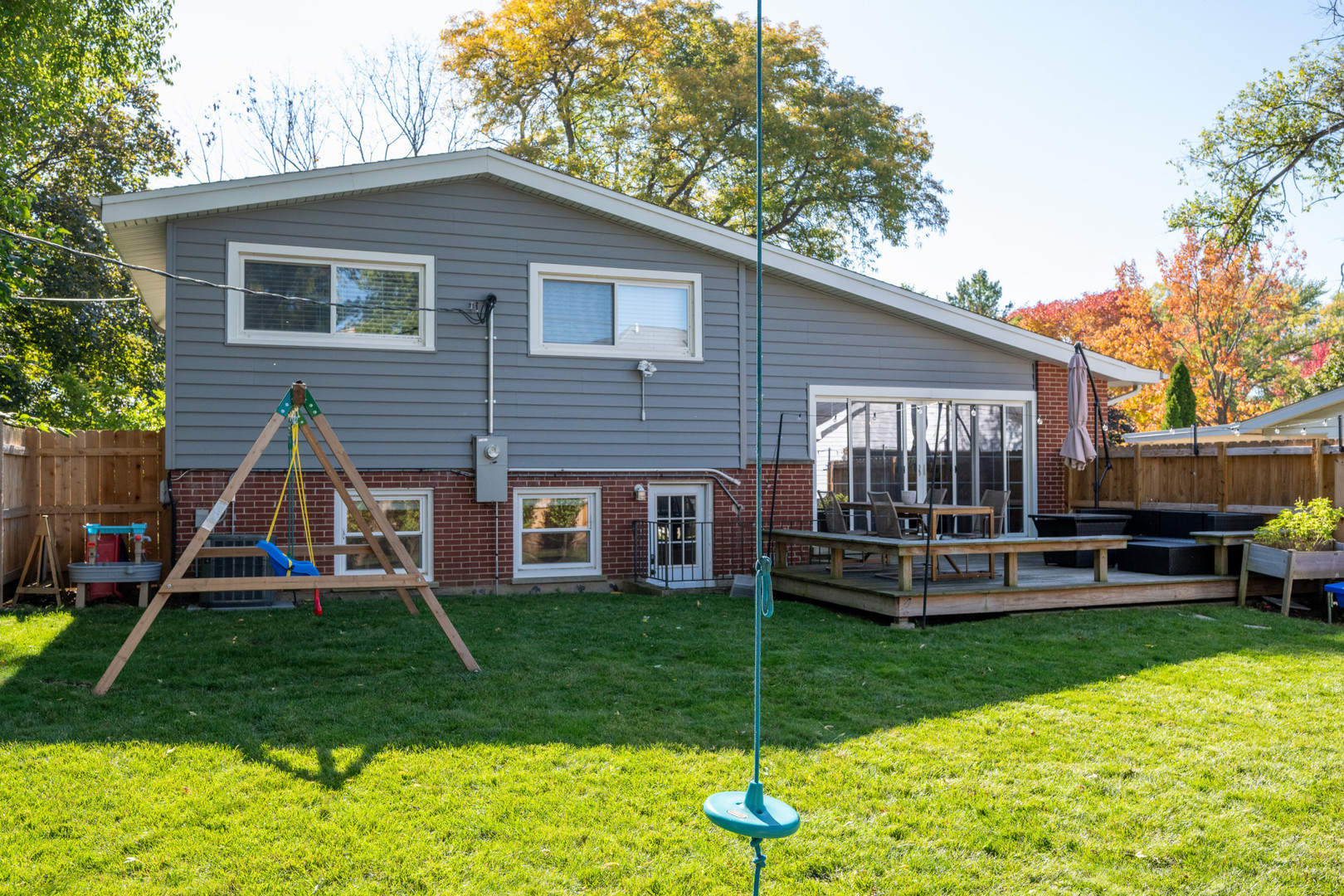 950 Brookside Lane Deerfield, IL 60015 - Photo 5 of 13 a front view of a house with garden