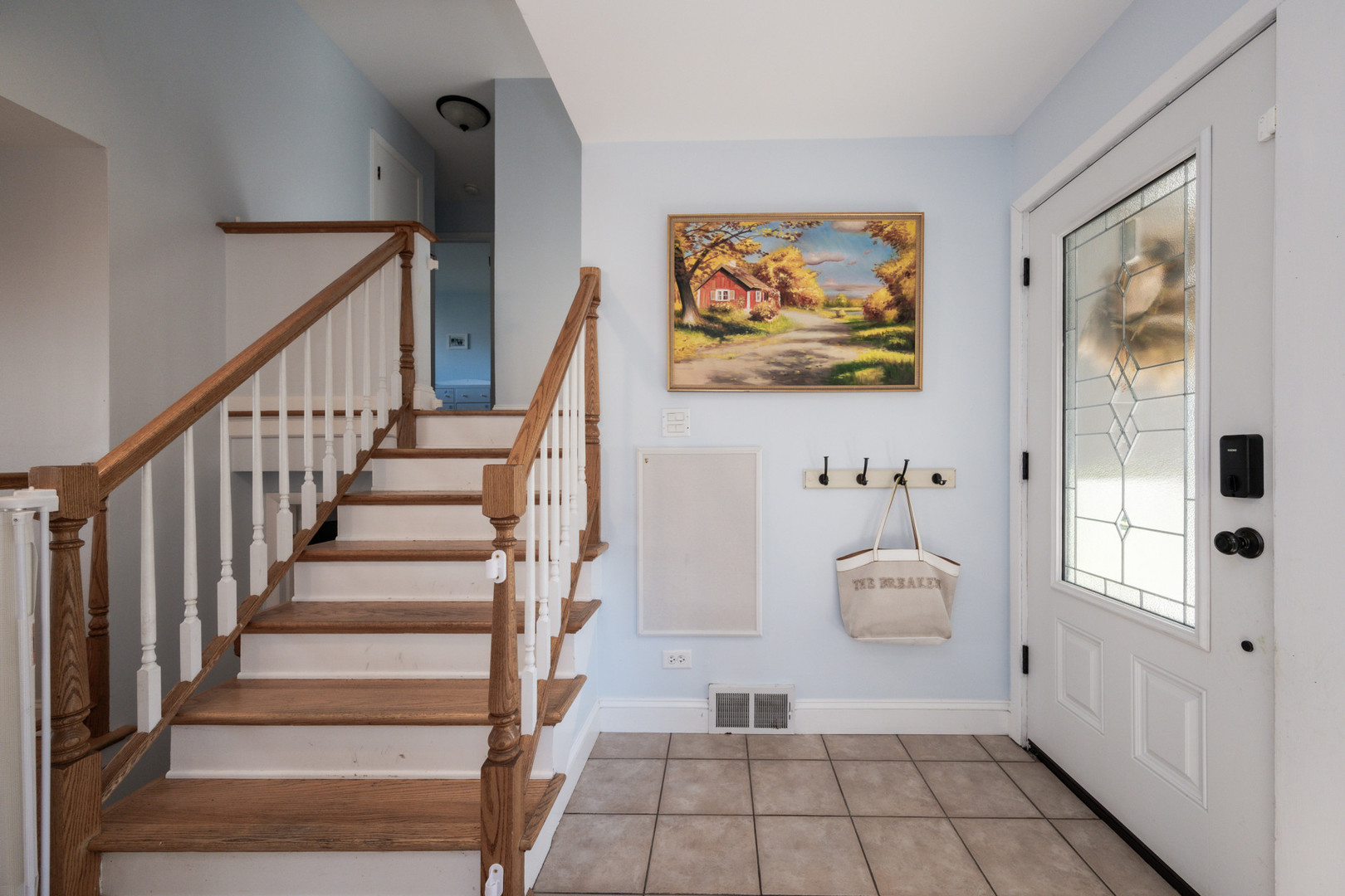 950 Brookside Lane Deerfield, IL 60015 - Photo 8 of 13 a view of a hallway with wooden floor and furniture