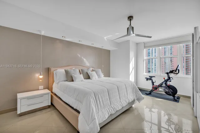 a bathroom with a shower and a sink