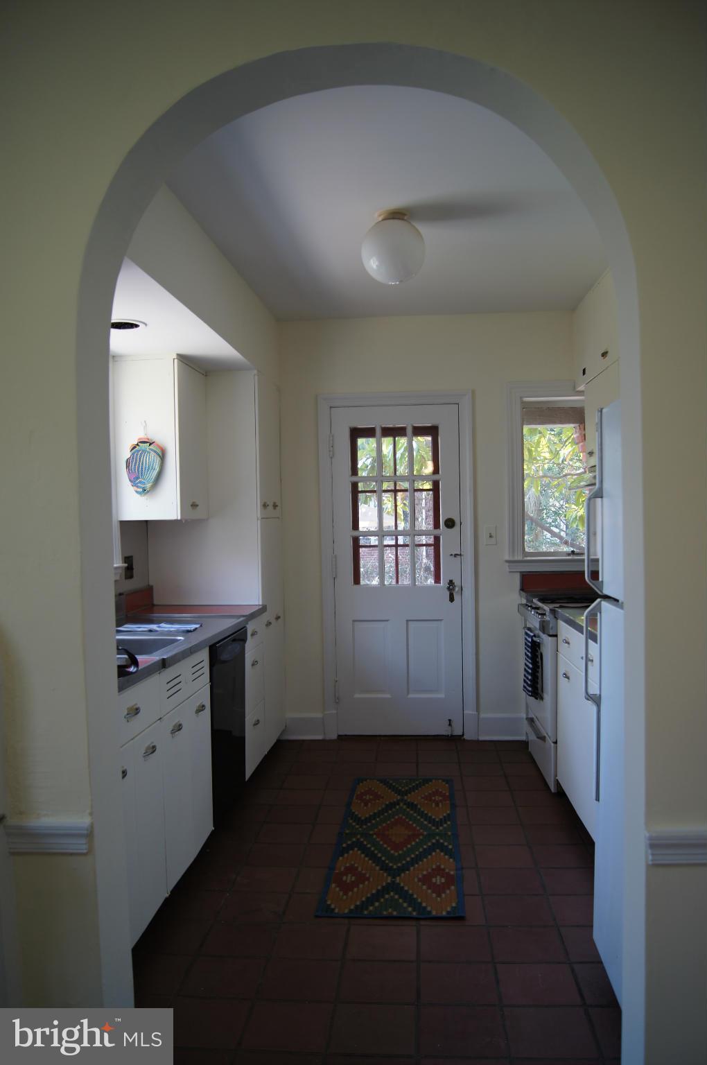 7101 Copeleigh Road Baltimore, MD 21212 - Photo 11 of 30 a room with a white cabinets and sink