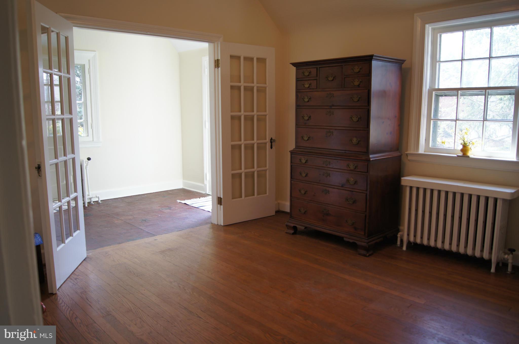 7101 Copeleigh Road Baltimore, MD 21212 - Photo 17 of 30 an empty room with windows and closet