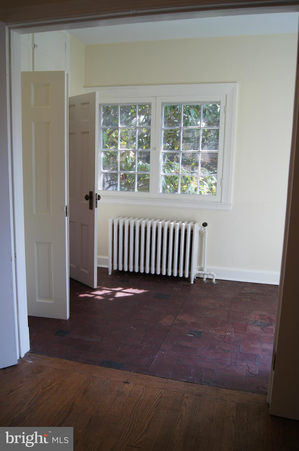 7101 Copeleigh Road Baltimore, MD 21212 - Photo 18 of 30 a view of a room with wooden floor and windows