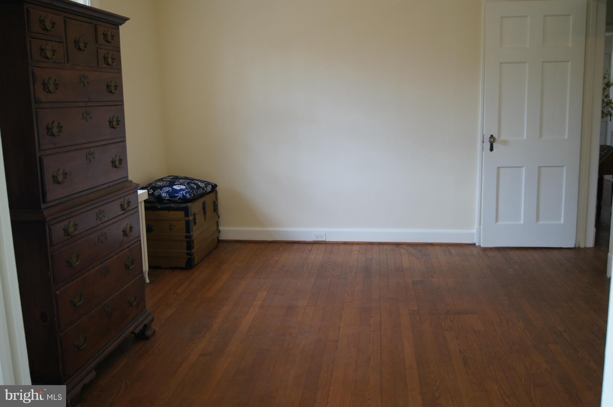 7101 Copeleigh Road Baltimore, MD 21212 - Photo 19 of 30 wooden floor in an empty room