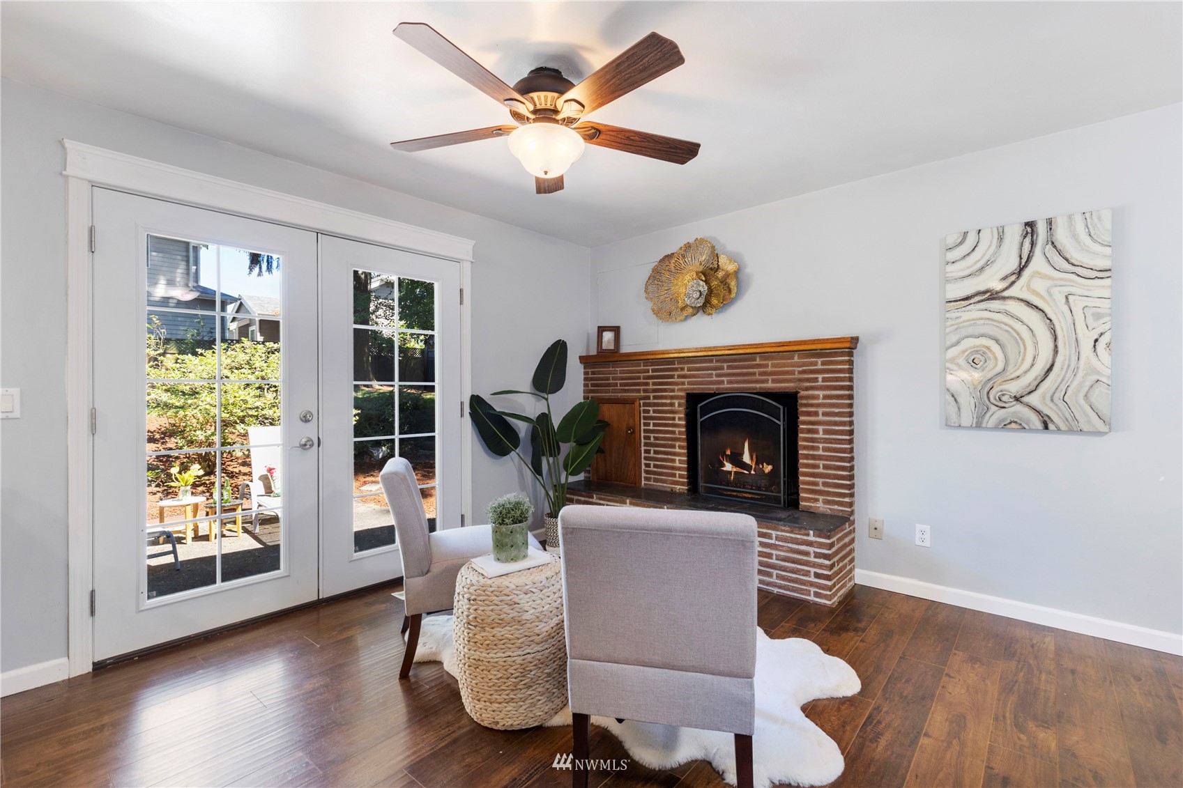 4514 Northeast 17th Place Renton, WA 98059 - Photo 13 of 39 a living room with furniture and a fireplace