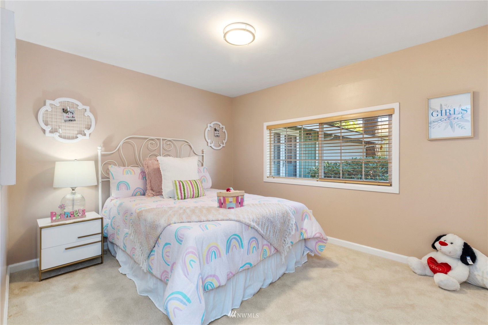 4514 Northeast 17th Place Renton, WA 98059 - Photo 3 of 39 a bedroom with a bed and a window