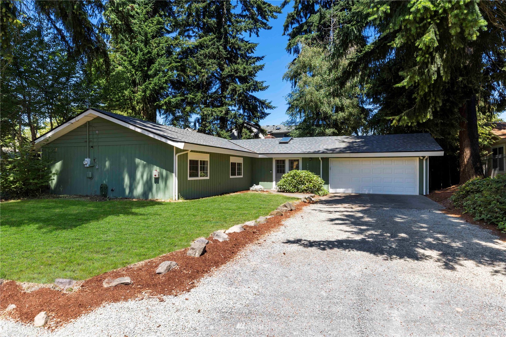 4514 Northeast 17th Place Renton, WA 98059 - Photo 31 of 39 a front view of house with yard and green space