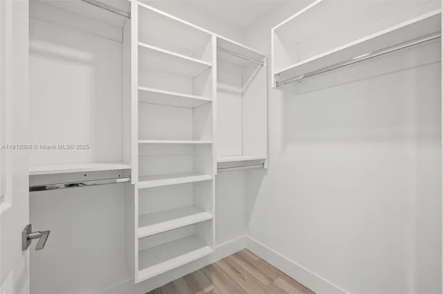 a bathroom with a sink double vanity and a mirror