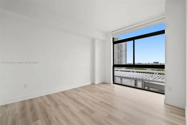 a outdoor living space with furniture and a potted plant