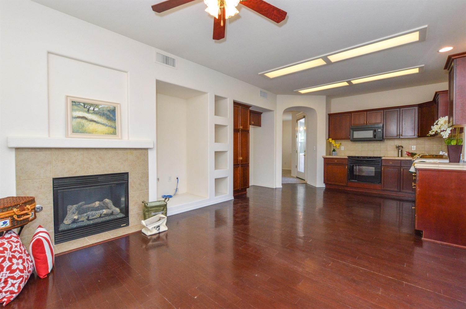 1687 Glen Oban Lane Clovis, CA 93619 - Photo 7 of 20 family room with kitchen