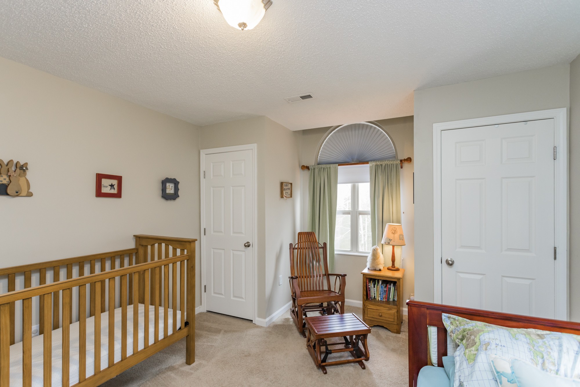4306 Kedron Road Spring Hill, TN 37174 - Photo 20 of 35 a bedroom with furniture and a window