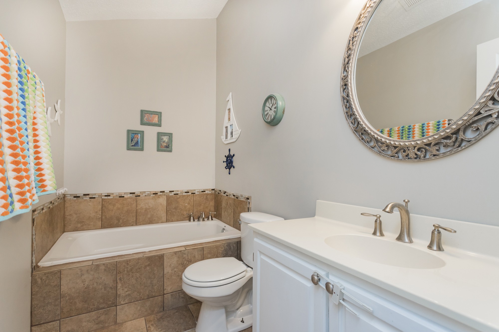 4306 Kedron Road Spring Hill, TN 37174 - Photo 21 of 35 a bathroom with a sink and a mirror