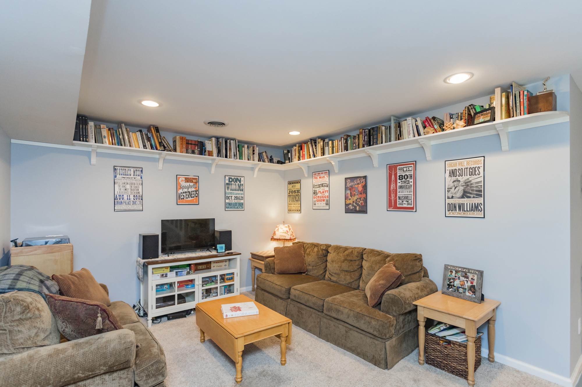 4306 Kedron Road Spring Hill, TN 37174 - Photo 25 of 35 a living room with furniture and a flat screen tv