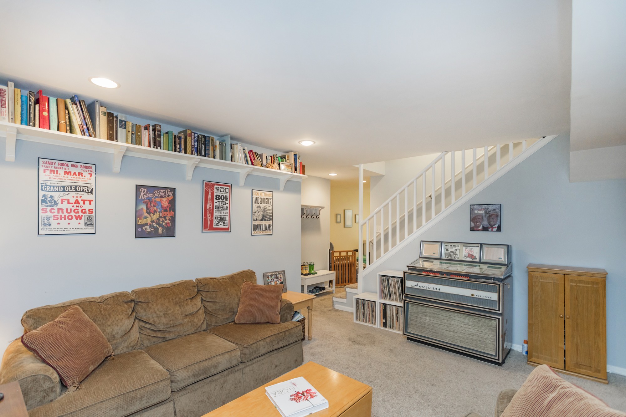 4306 Kedron Road Spring Hill, TN 37174 - Photo 26 of 35 a living room with furniture and stairs