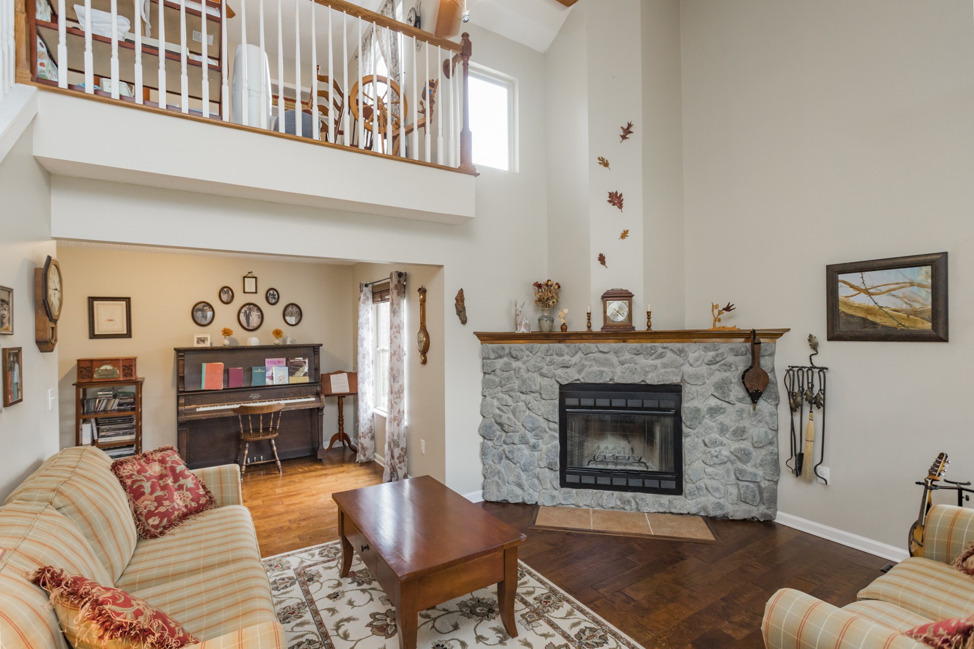 4306 Kedron Road Spring Hill, TN 37174 - Photo 3 of 35 a living room with fireplace furniture and a fireplace