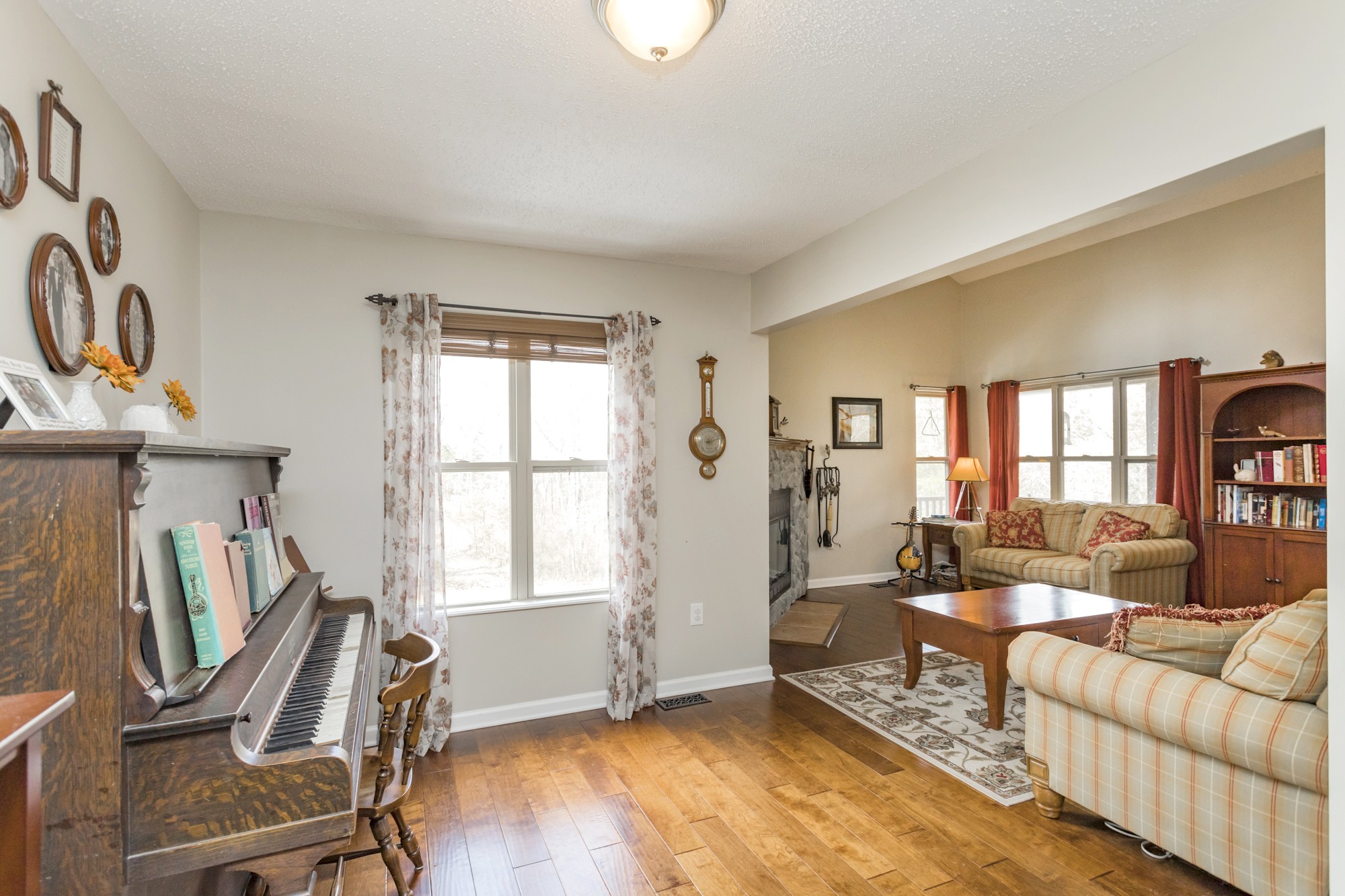 4306 Kedron Road Spring Hill, TN 37174 - Photo 5 of 35 a living room with furniture a window and wooden floor