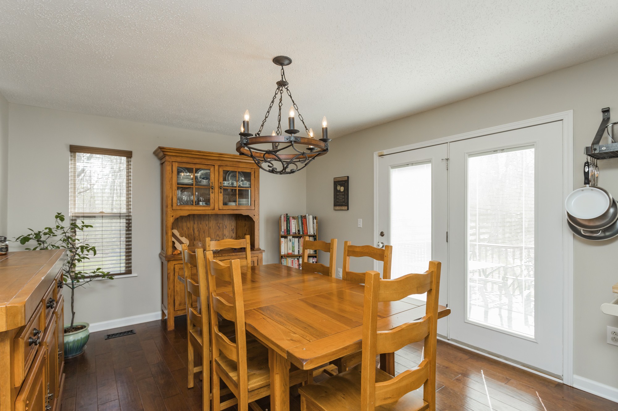 4306 Kedron Road Spring Hill, TN 37174 - Photo 8 of 35 a view of a dining room with furniture window and wooden floor